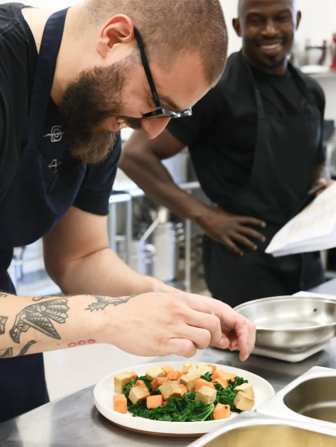 Miguel Angel Camacho plating a dish